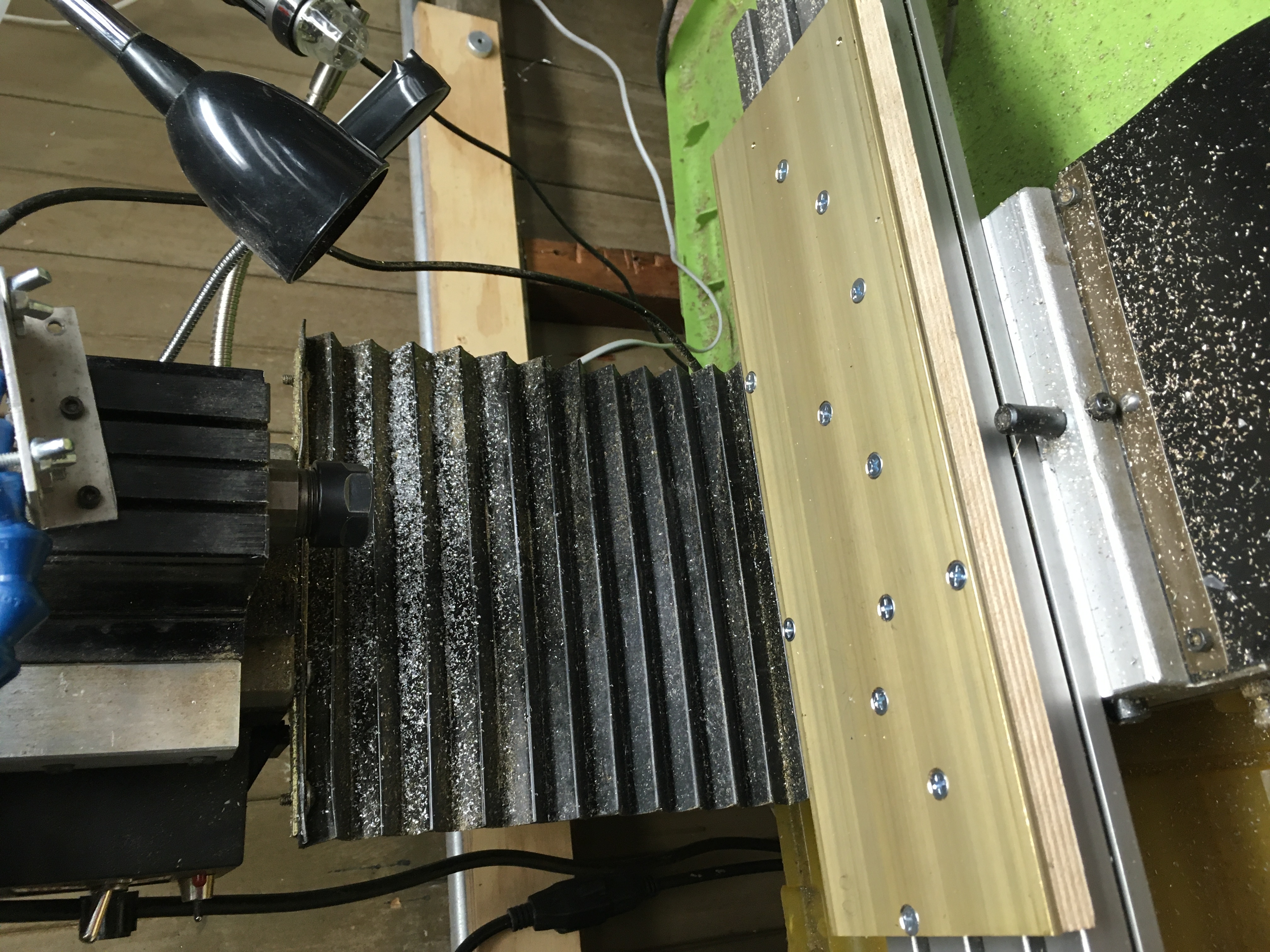 Brass plate screwed to sacrificial wood base